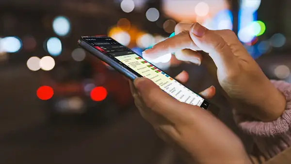 BARD Tracker is optimized for mobile Women using BARD Tracker on her phone